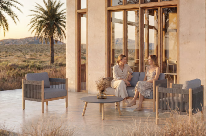 A welcoming outdoor living space with a pergola